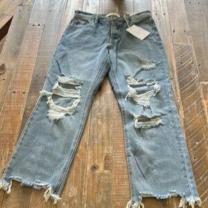 Distressed Blue Jeans
